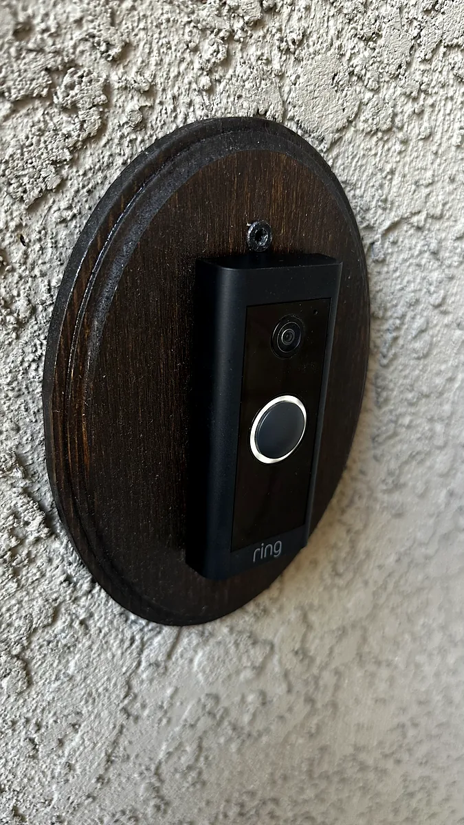 Video doorbell mounted on an exterior wall