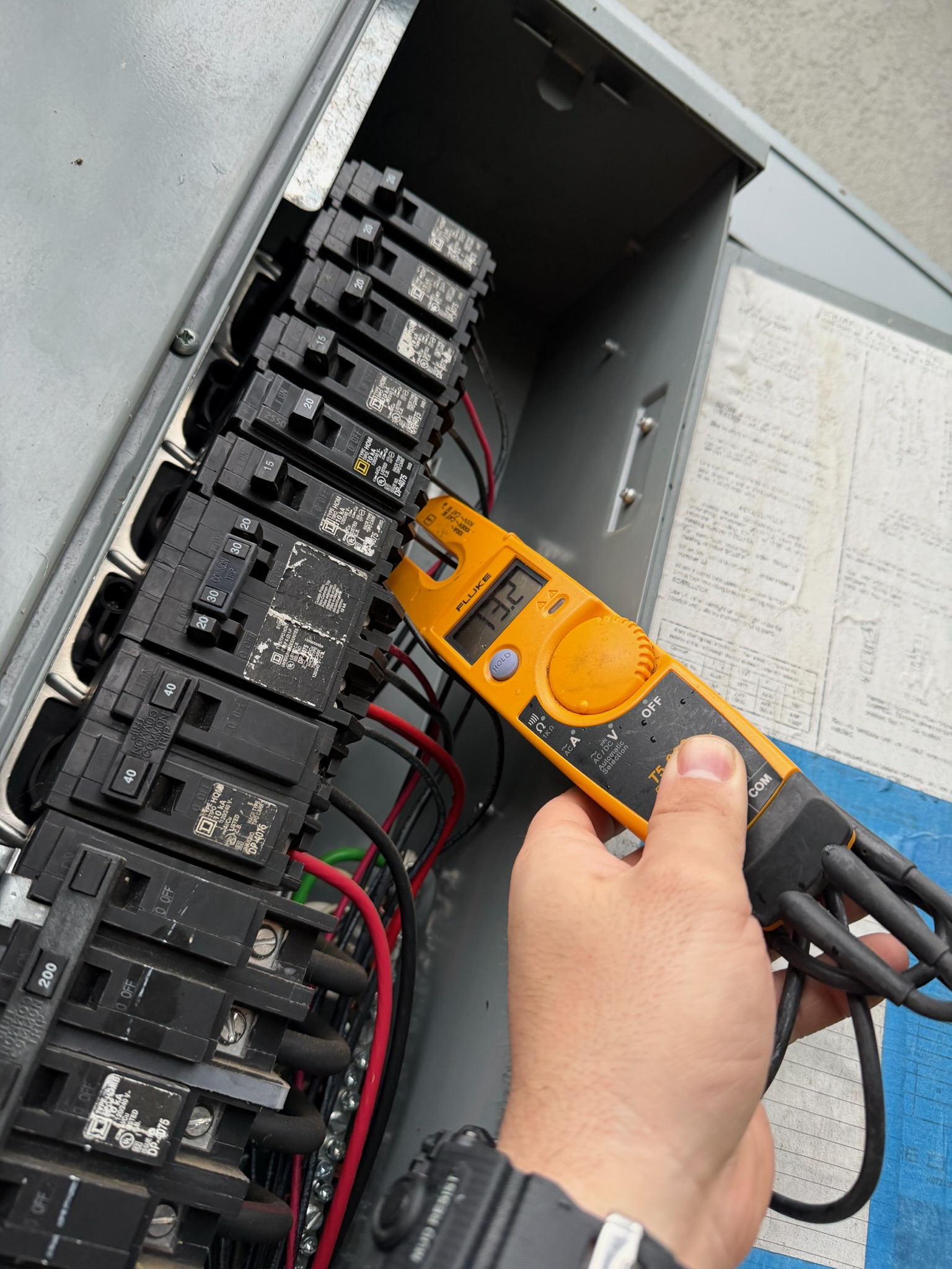 Licensed electrician performing electrical diagnostics in Sacramento